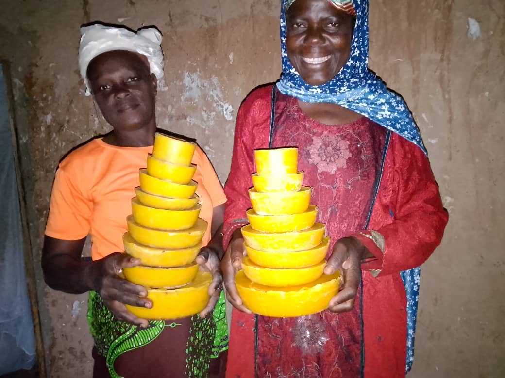 2026-04-03_011128_women_with_beeswax_ingots.jpg